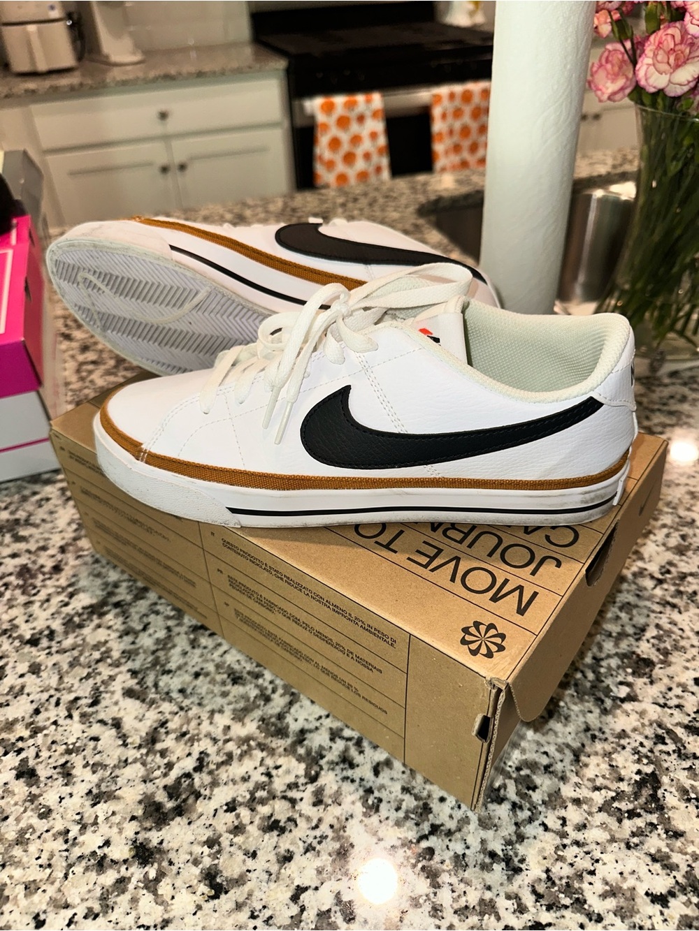 Nike White Sneakers with Black Swoosh and Brown Trim